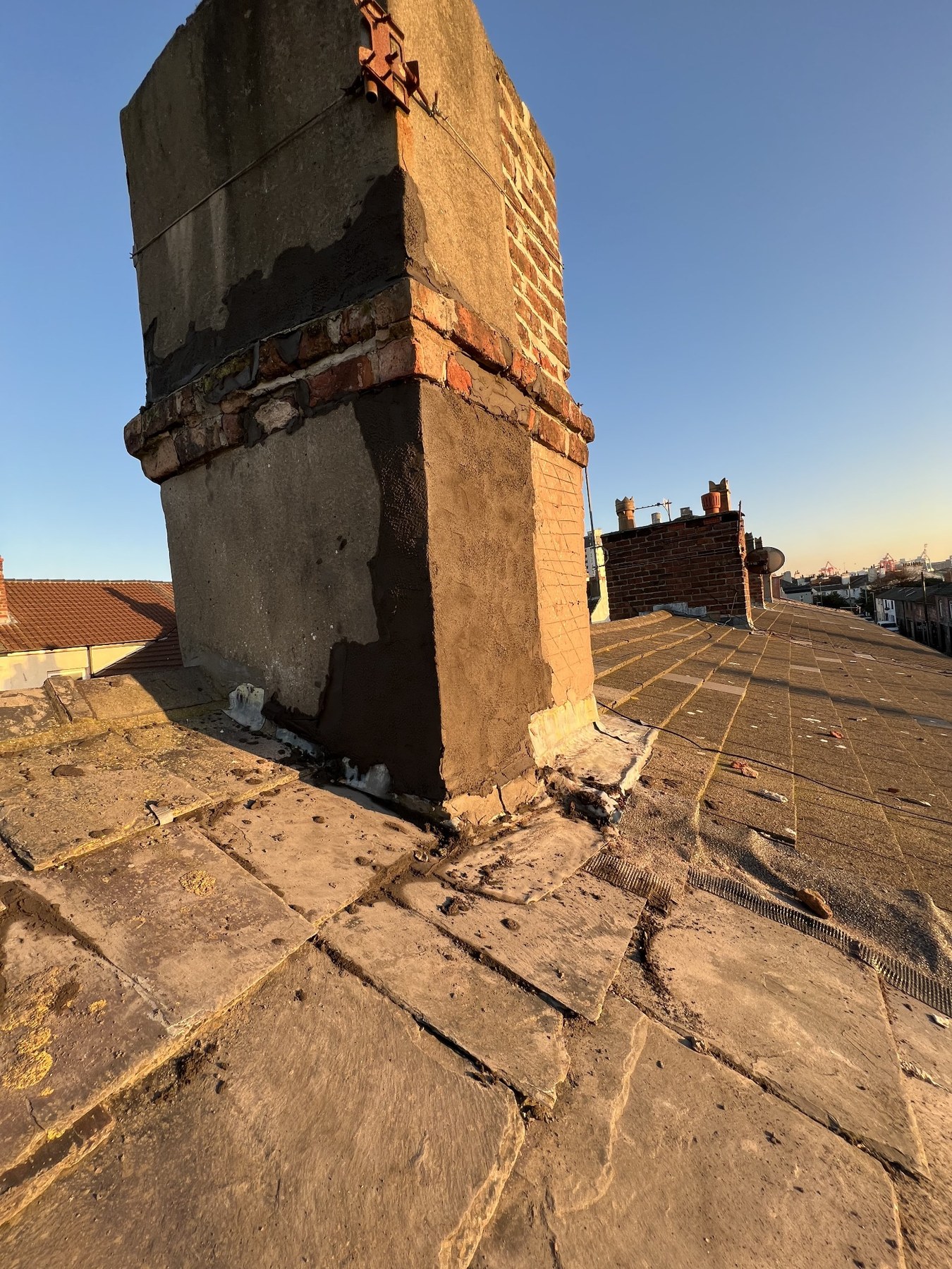Chimney stack during render repair by Wavertree Roofing