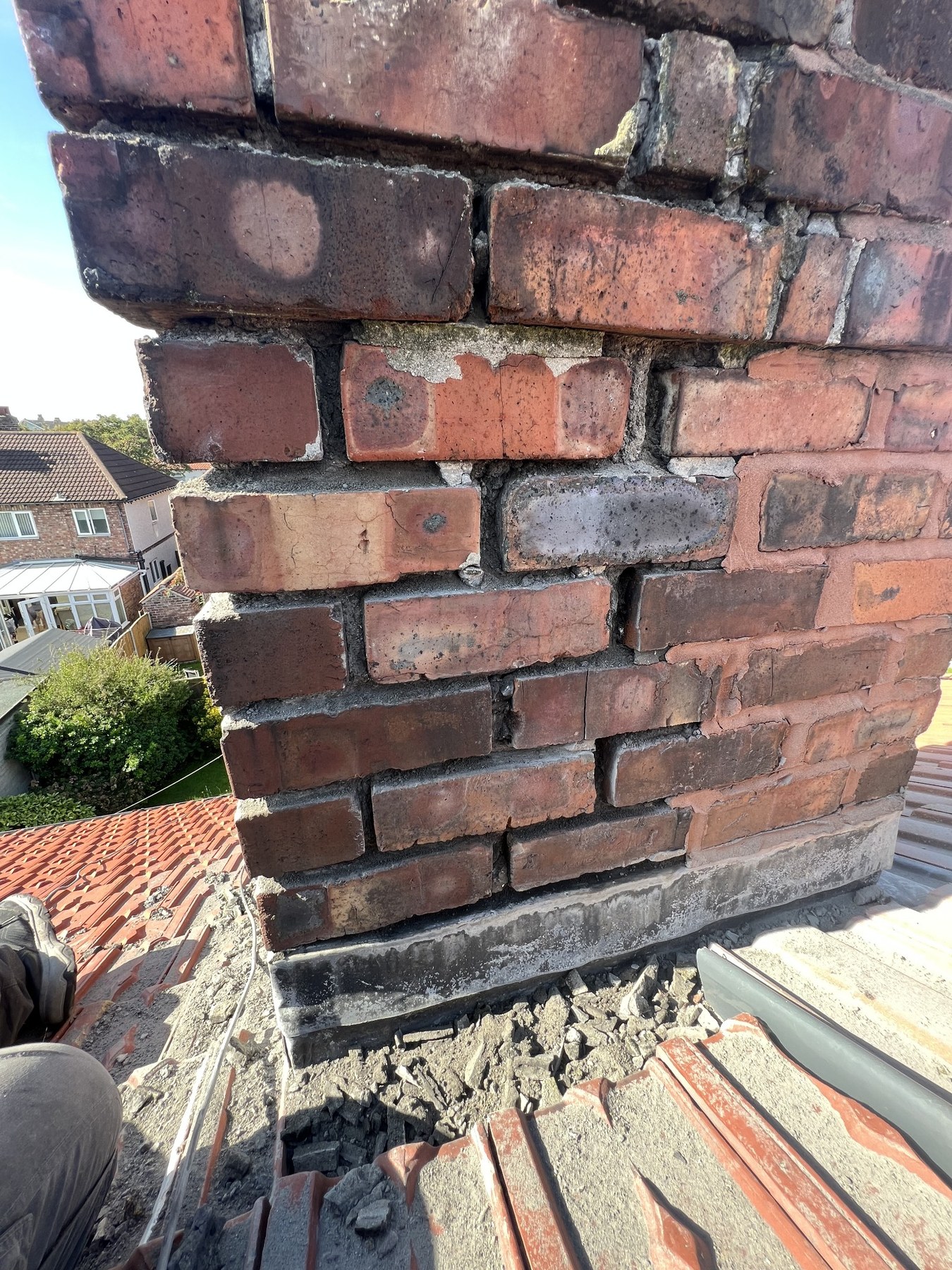 Chimney with failed mortar joints before repointing by Wavertree Roofing