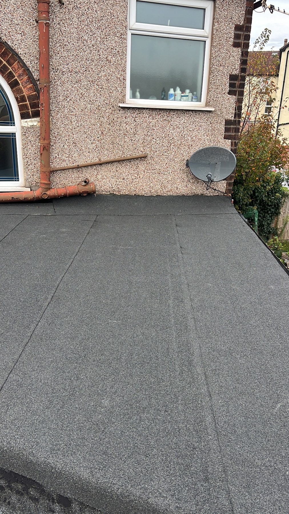 Completed flat roof re-felting viewed from the roof edge by Wavertree Roofing