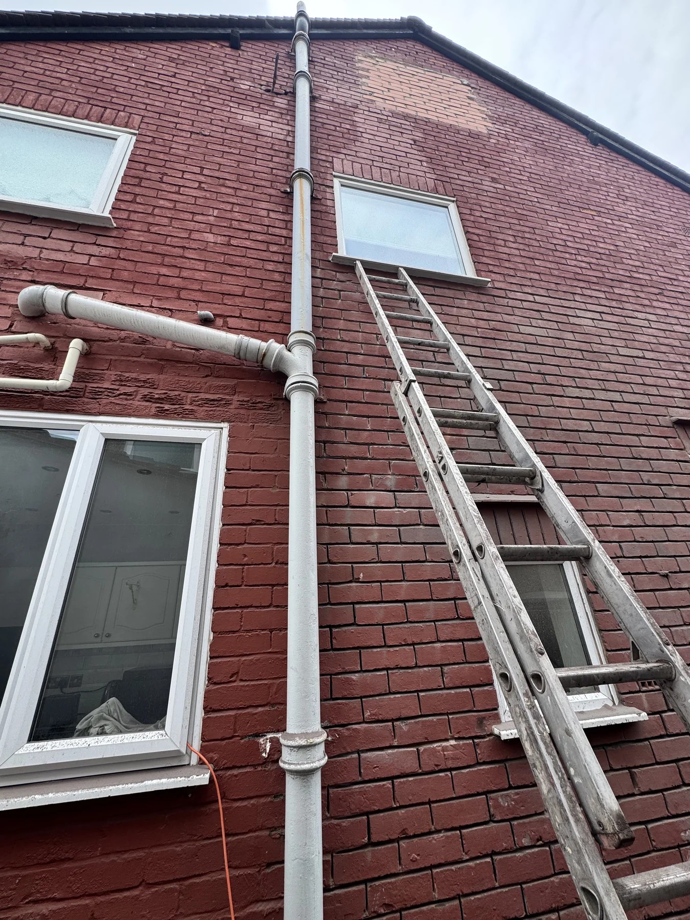 Exterior brickwork before pointing work by Wavertree Roofing